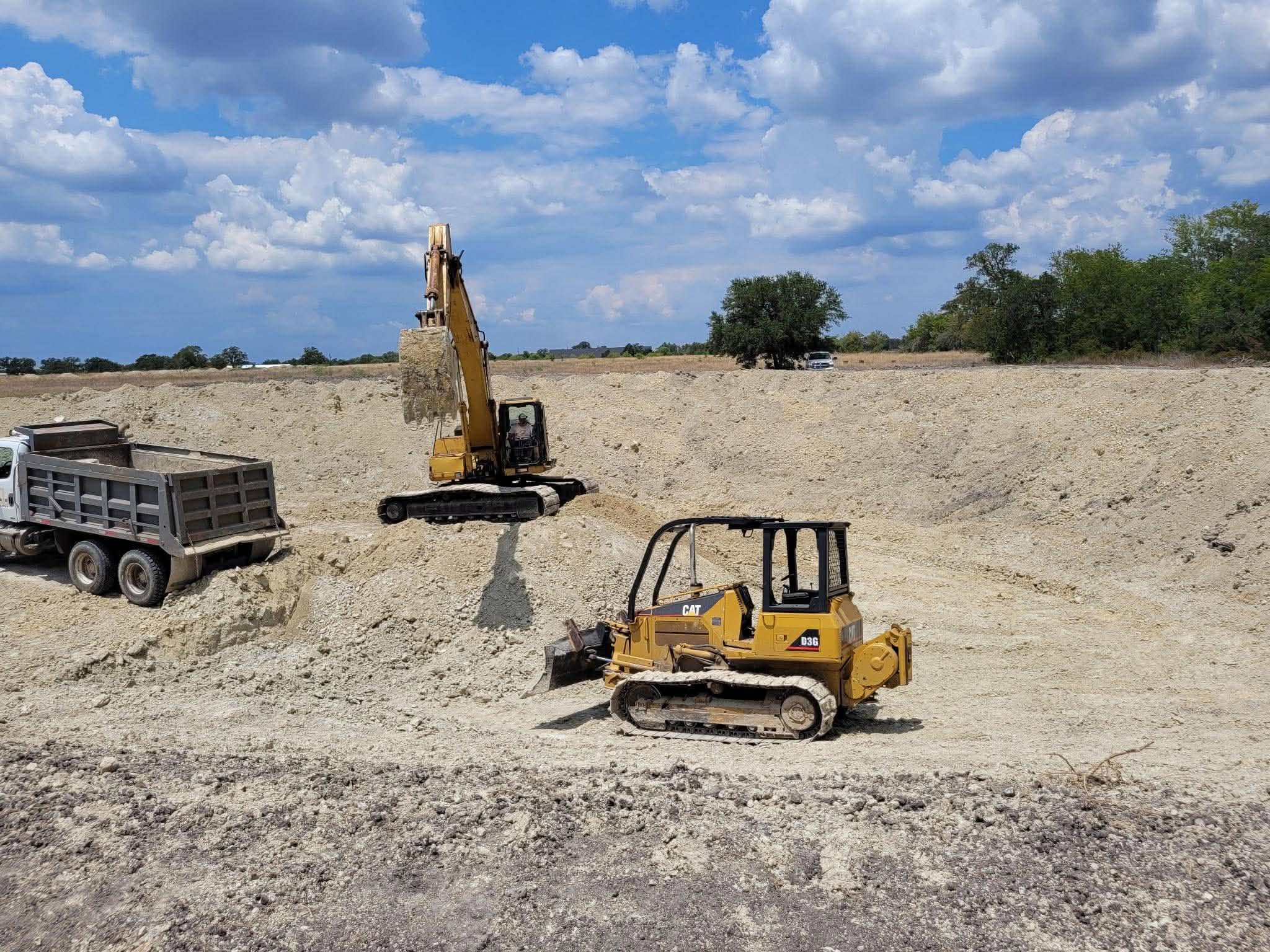 Excavation equipment digging a foundation area